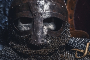 Picture man's skull in the helmet on chain armour